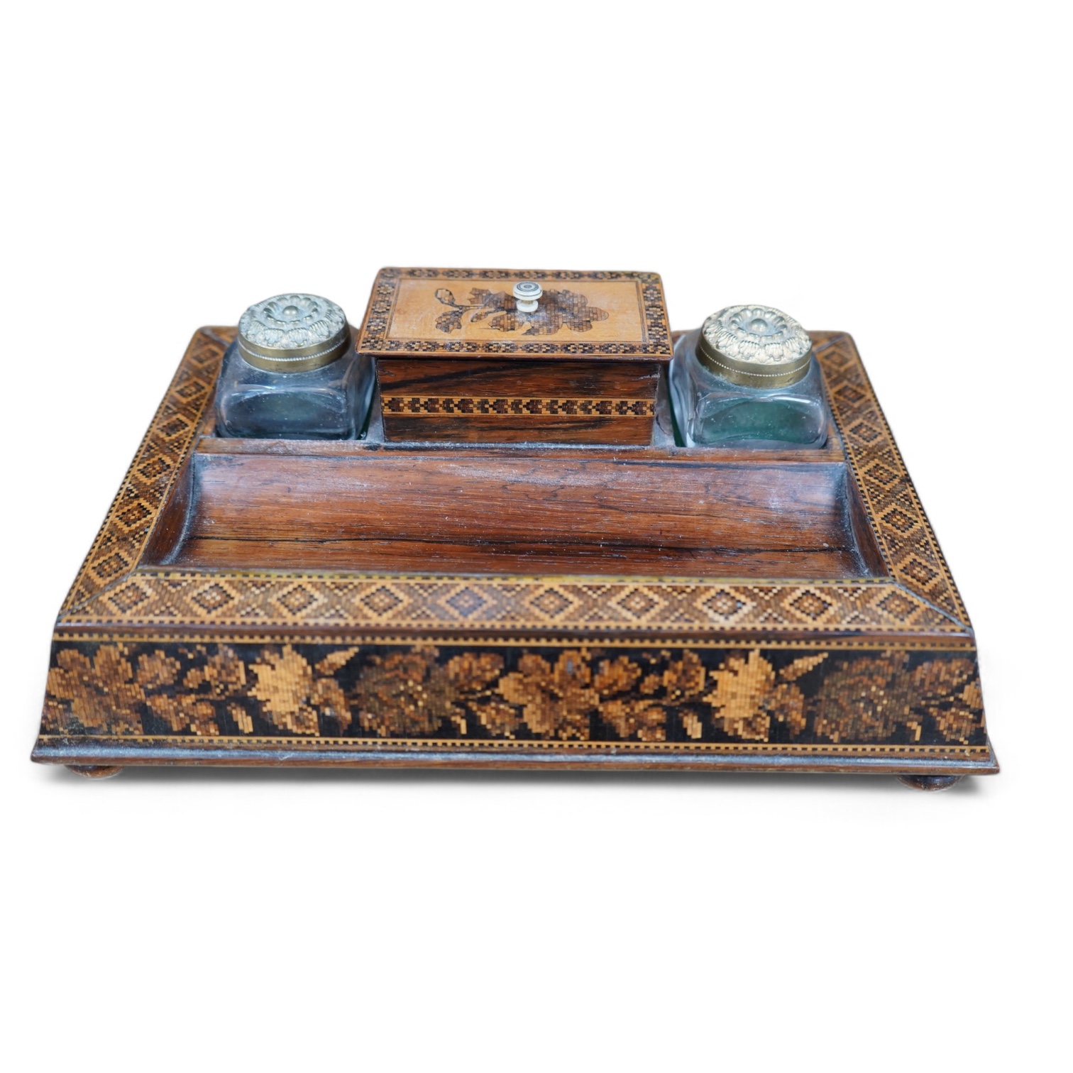 A Tunbridgeware rosewood inkstand with two glass ink bottles, 26cm wide. Condition - fair